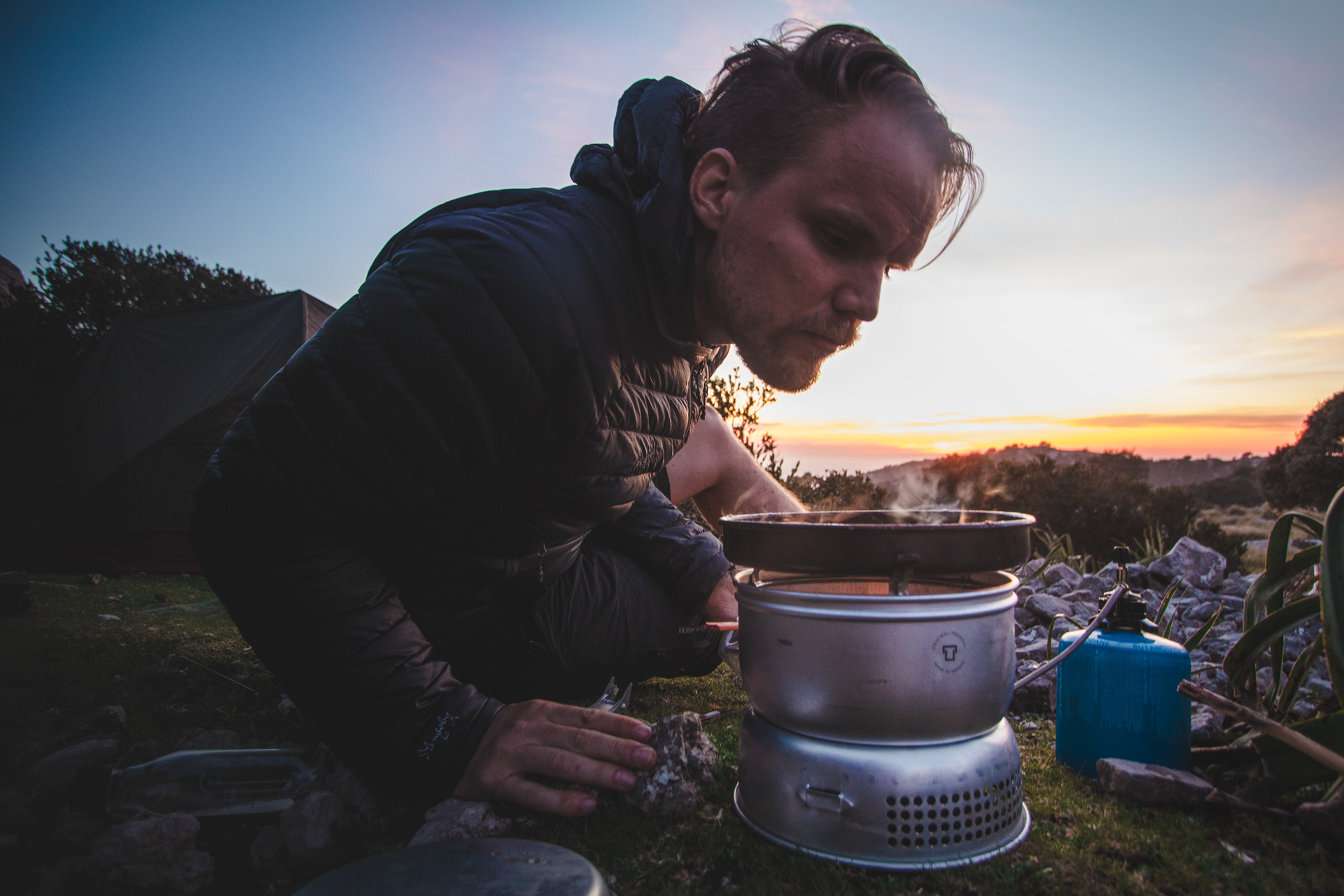 Cooking Man smelling his Tortilla Española the Trangia 25-4 UL (Ultralight Aluminium) Cooking Set