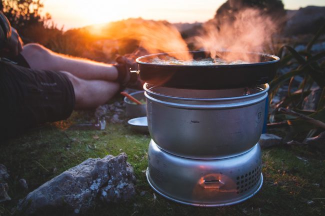 The Trangia 25-4 UL (Ultralight Aluminium) Cooking Set in front of a mallorcan sunset