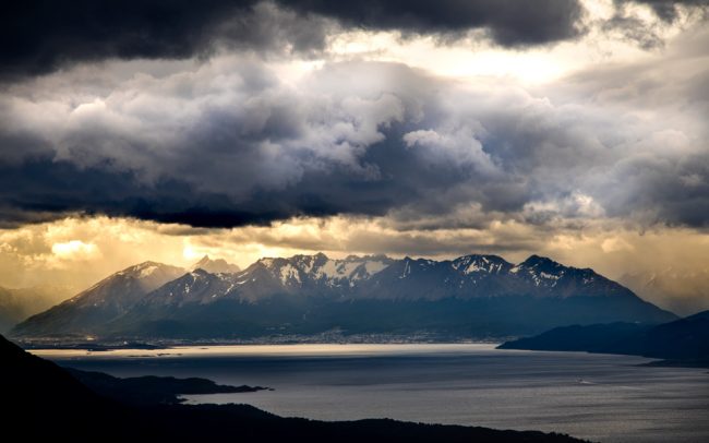 Sunset Ushuaia Sun through clouds Mountains