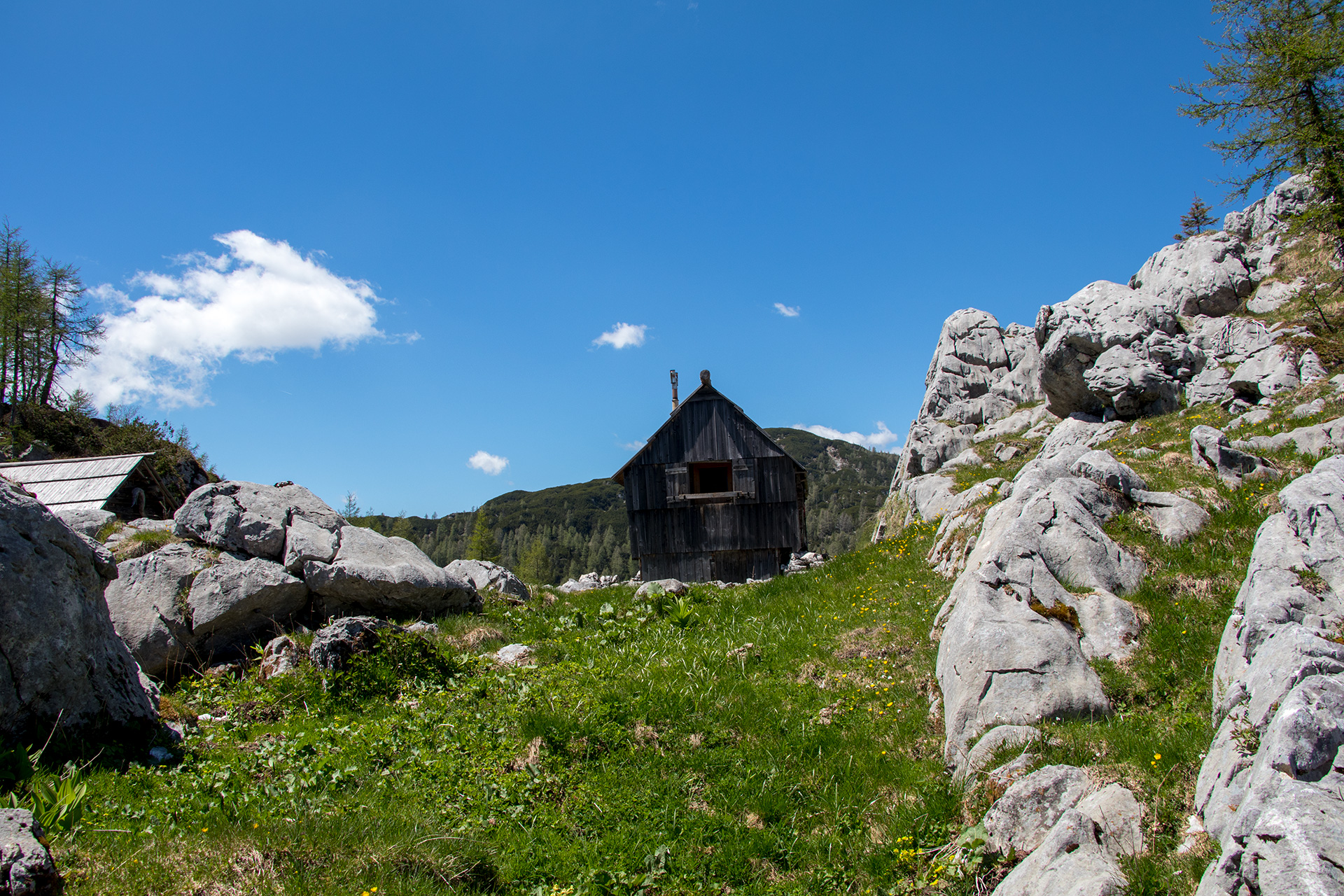 Outsidematerial_Julian_Alps_forest_village_rocks Shepherds’ huts at the Dedno Polje mountain pasture