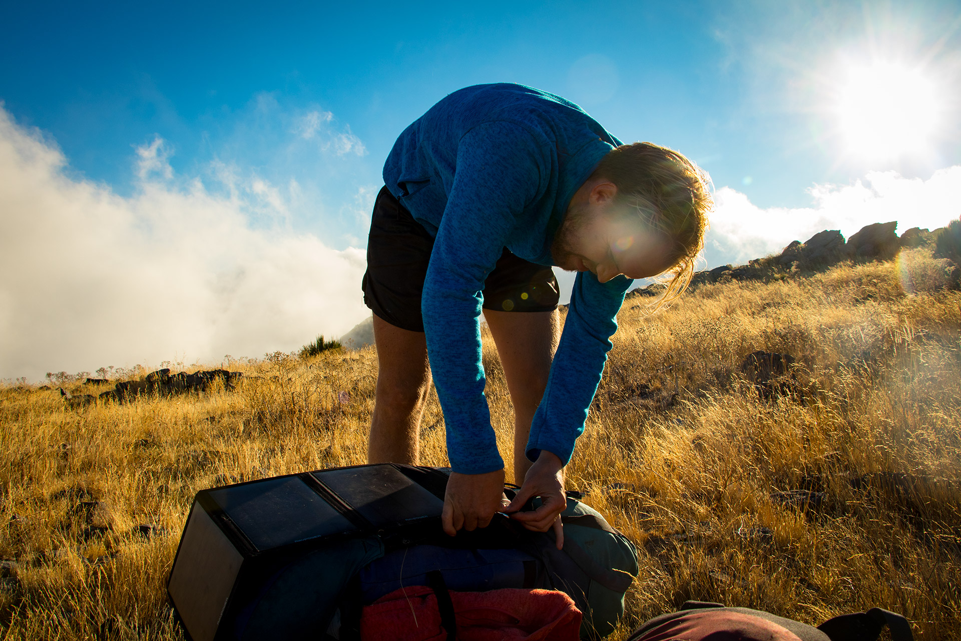 outsidematerial-madeira-hiking-guy-pitching-tent